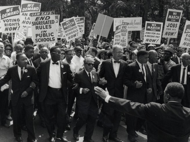 Anti-segregation march featuring Rev. Martin Luther King Jr. Source: Athena LeTrelle, on Flickr. CC BY-ND 2.0.