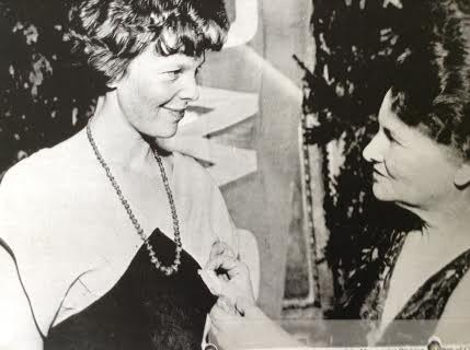 Harriet Chalmers Adams awards Amelia Earhart the Society’s Gold Medal. Source: Earhart, Box I:II, RSWG.