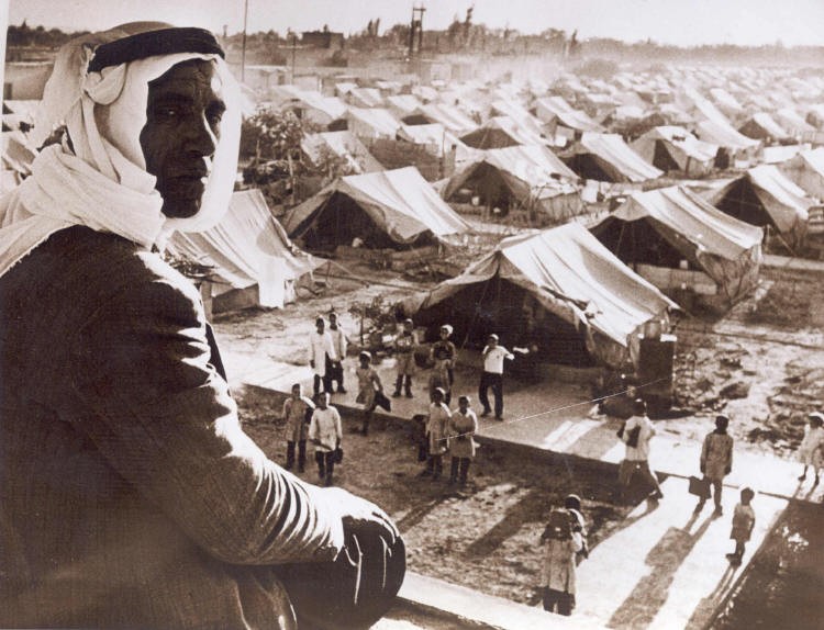 "Nakba 1948 Palestine - Jaramana Refugee Camp, Damascus, Syria." Source: Wikimedia Commons, Public domain.