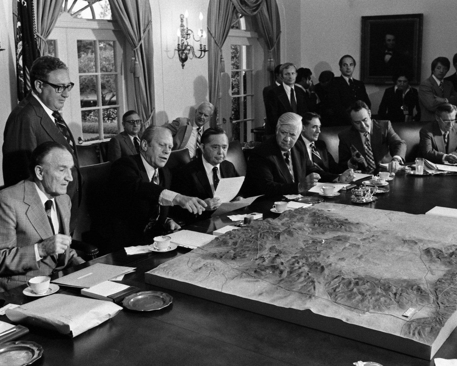 President Gerald R. Ford and Secretary of State Henry Kissinger Review a Map of the Sinai Peninsula, 1975. Source: National Archives. President Gerald R. Ford and Secretary of State Henry Kissinger Review a Map of the Sinai Peninsula during a Meeting with Bipartisan Congressional Leaders in the Cabinet Room, 9/4/1975