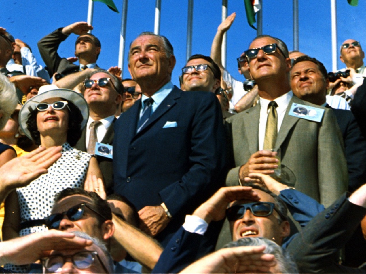 President Johnson and crowd watch return of Apollo 11. Source: NASA The Commons, Flickr - Public Domain