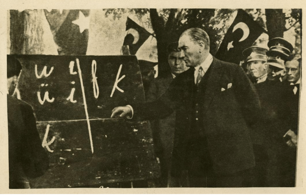 Mustafa Kemal Atatürk holding a demonstration of the new Turkish alphabet (Kayseri, Turkey, September 20, 1928). Source: İBB Atatürk Kitaplığı