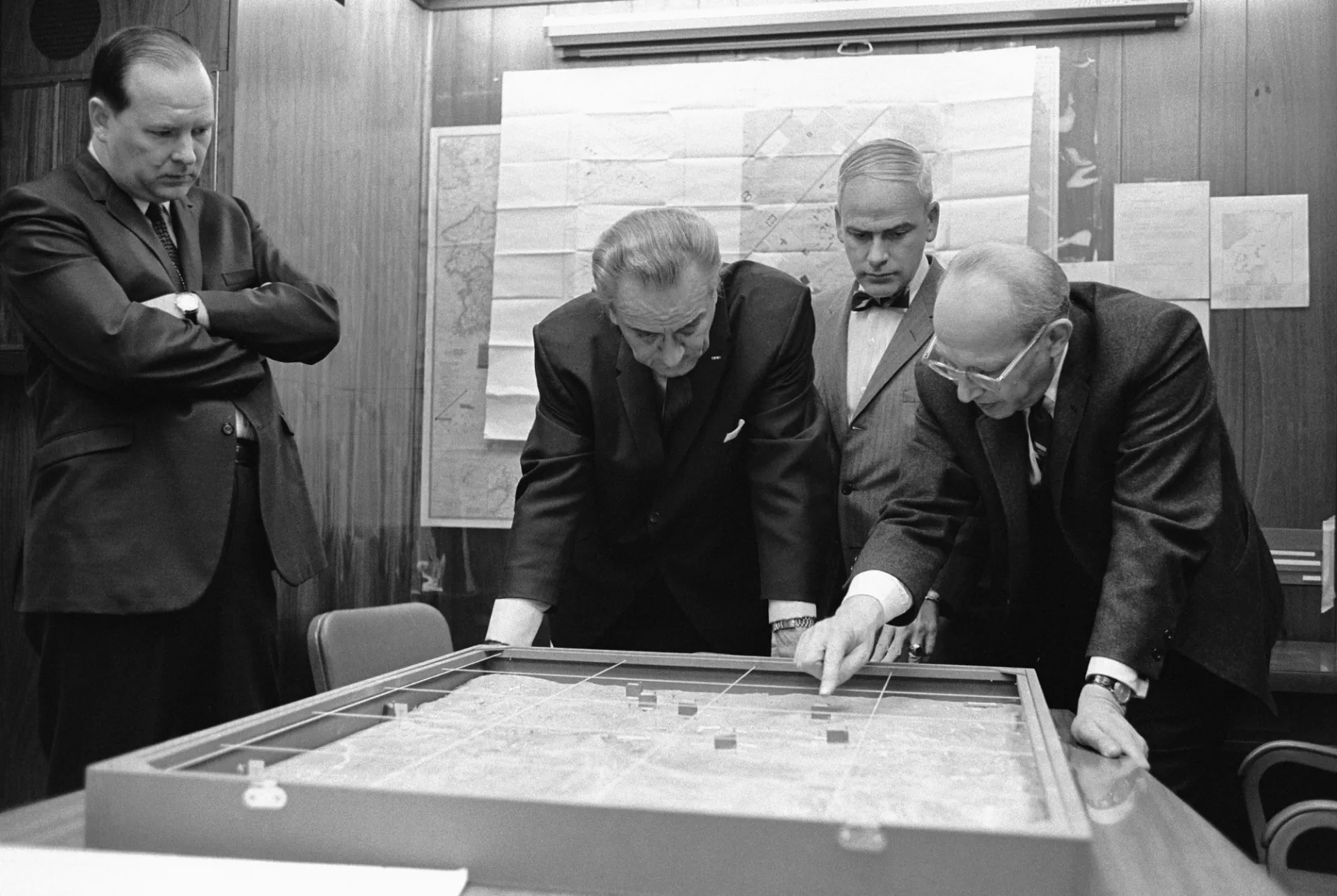 President Lyndon Johnson examines a model of strategic positioning in South Vietnam. Source: National Archives and Records Administration