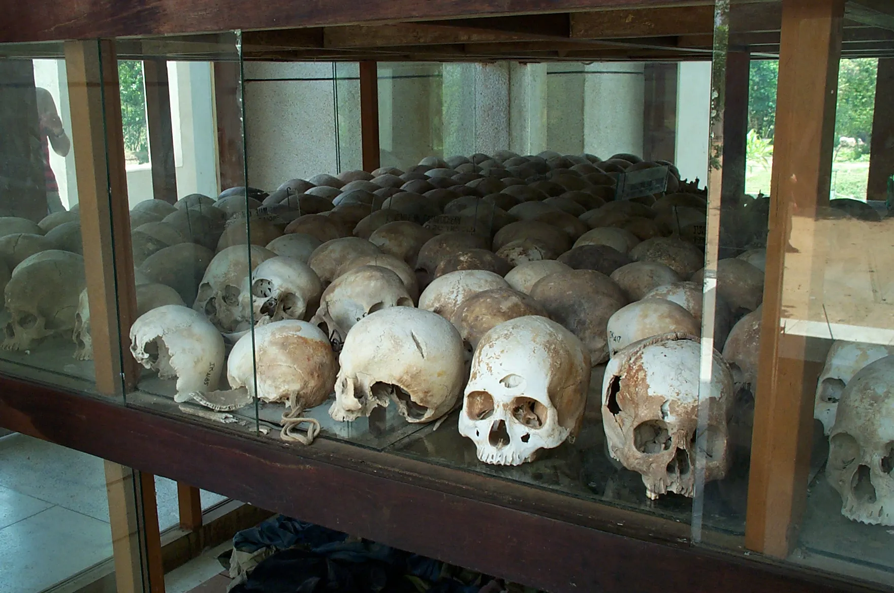 Skulls displayed in the Stupa at Choeung Ek, Cambodia. Source: Wikimedia Commons, Public domain.