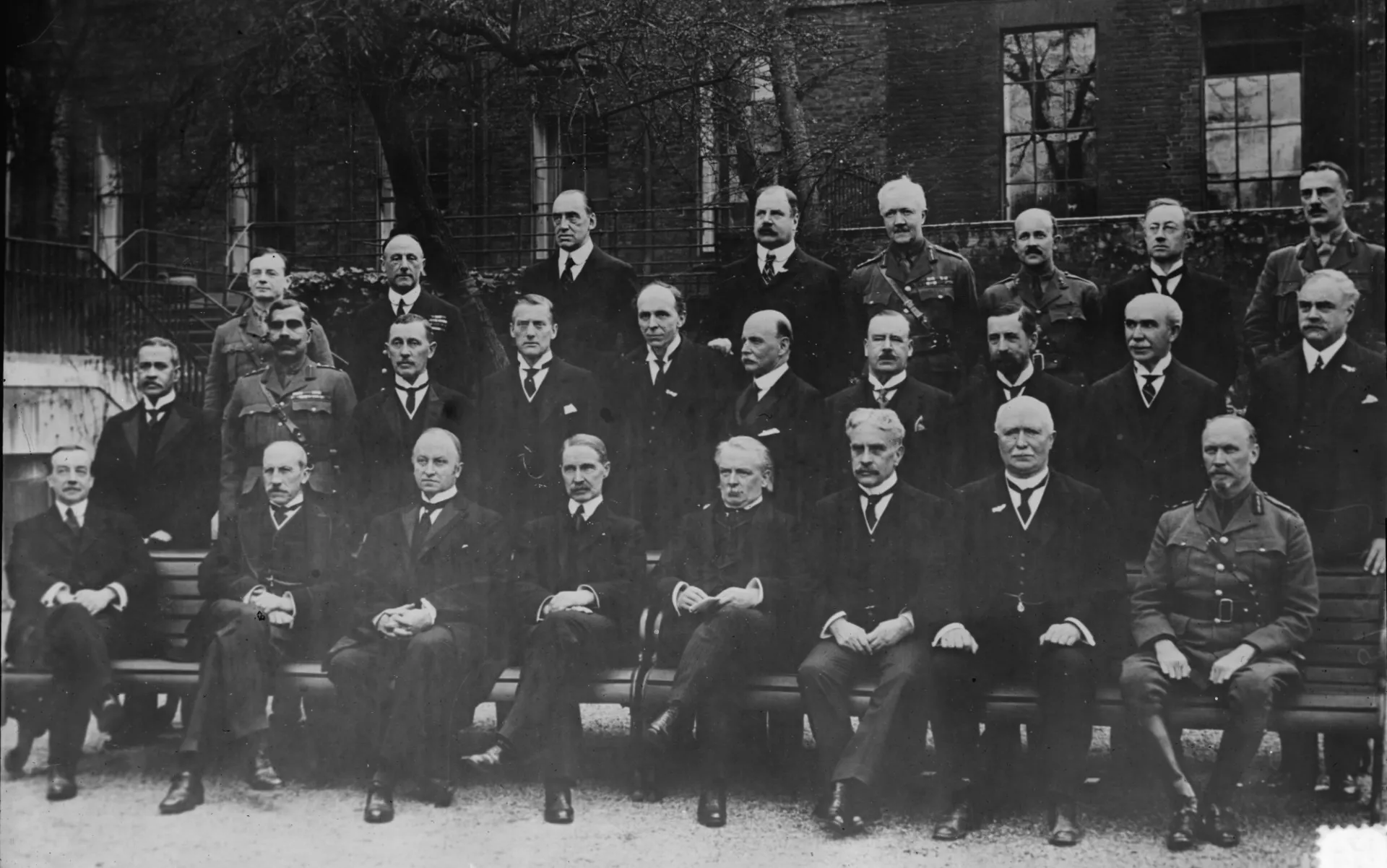Imperial War Cabinet in 1917 (cropped)” — group photograph of the Imperial War Cabinet at No. 10 Downing Street, London, 1 May 1917; originally from the George Grantham Bain Collection via the Library of Congress; public domain. Source: https://commons.wikimedia.org/wiki/File:Imperial_War_Cabinet_in_1917_(cropped).jpg