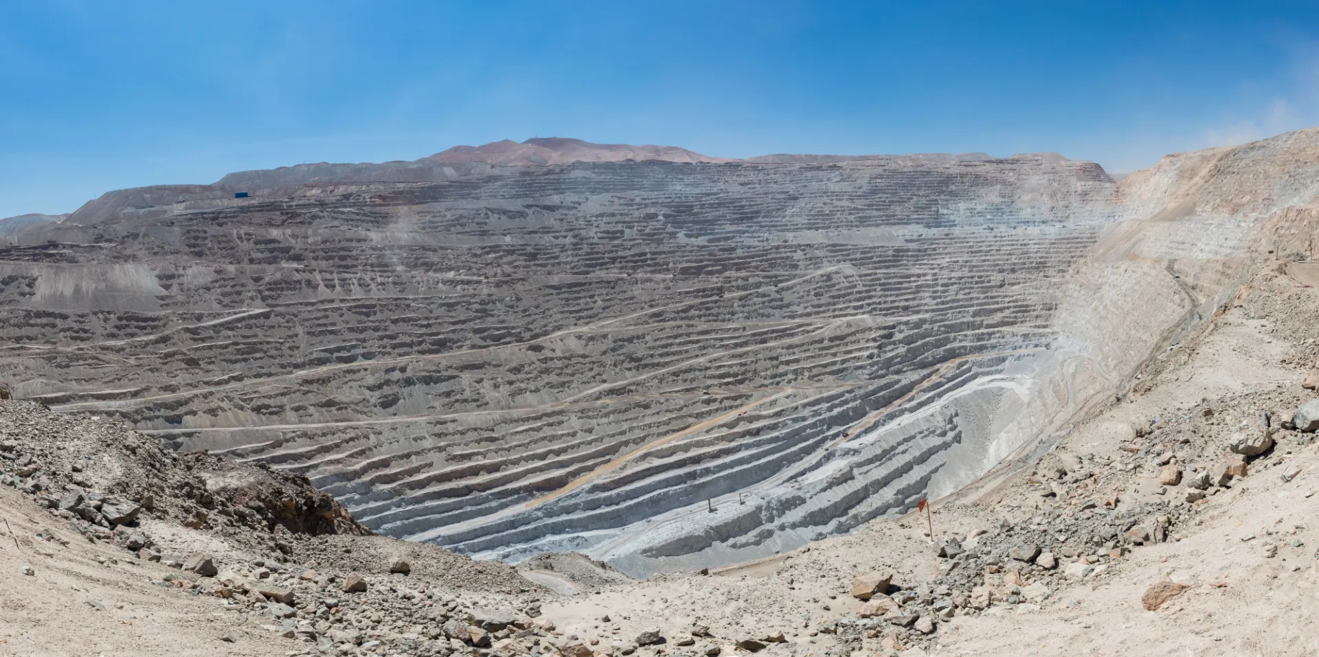 “Mina de Chuquicamata, Calama, Chile, 2016-02-01” by Diego Delso, CC BY-SA 4.0. Source: https://commons.wikimedia.org/wiki/File:Mina_de_Chuquicamata,_Calama,_Chile,_2016-02-01,_DD_110-112_PAN.JPG